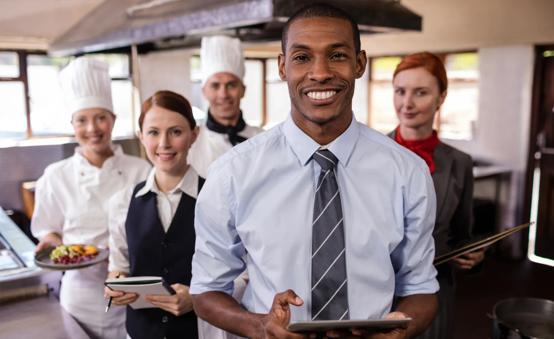 group-of-hotel-staffs-working-in-kitchen